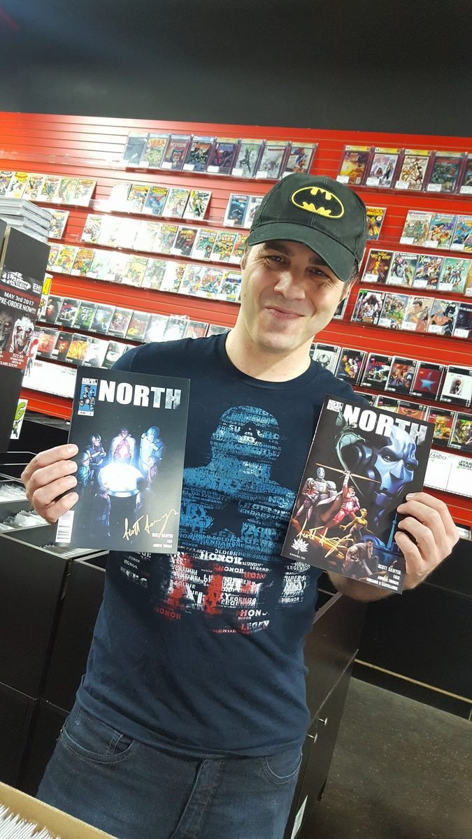 Scott Sawyer holding issues of NORTH
